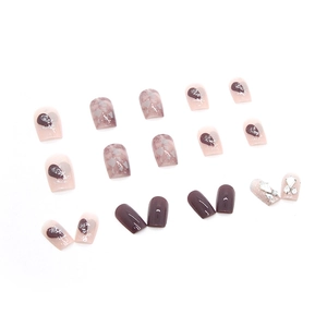 Purple and marble press-on nails with heart designs and glitter rhinestones set