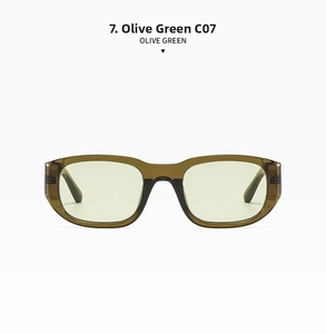 Detail view of stylish olive green square sunglasses with translucent frames and temple design