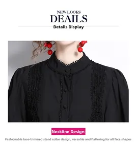 Detail of elegant black dress showing high neck collar with lace and pleated puff sleeves