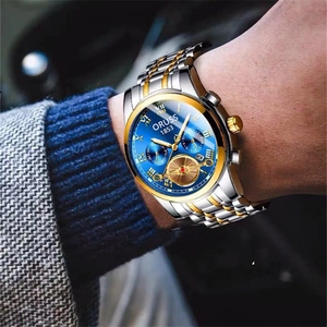 Detail of ORUSS business watch featuring two-tone steel strap and blue textured dial