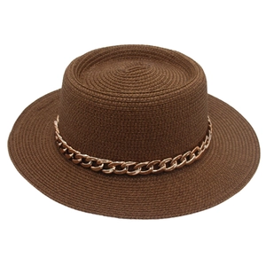 Detail of dark brown boater hat featuring a stylish chunky gold chain band decoration