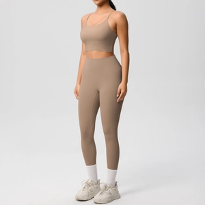 Detail of khaki high-waisted yoga leggings and U-neck sports bra with brushed texture