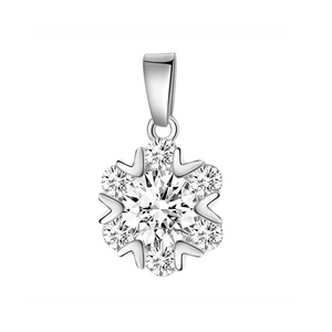 Macro shot of silver flower pendant with brilliant-cut cubic zirconia in center