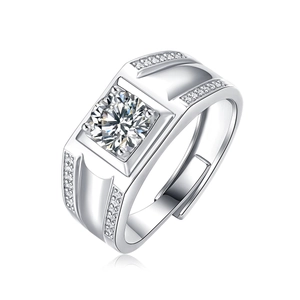 Detailed macro of a 925 silver moissanite men's ring with polished square setting and diamond