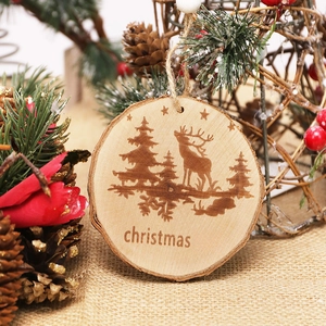 Natural wood Christmas ornament featuring laser-cut reindeer and forest design