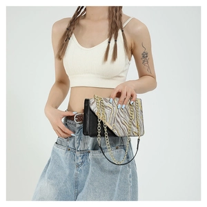 Crossbody bag with stone pattern flap and golden chain strap for women