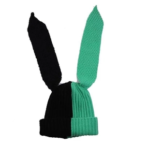 Detail shot of the two-tone black and green long rabbit ear beanie with ribbed knit texture