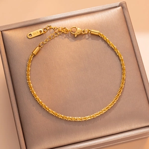 Elegant 18K gold-plated titanium steel chain bracelet with a textured starry finish