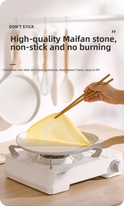 Close-up of non-stick maifan stone pan making pancakes on a portable gas stove