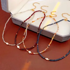 Handmade titanium steel necklace with faceted beads and a white freshwater pearl centerpiece
