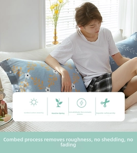 Close-up of sky blue floral cotton pillowcase featuring eco-friendly reactive printing