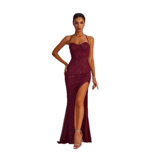 Elegant burgundy sequin halter neck evening dress with high slit and slim fit silhouette