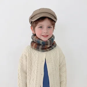 Kids beige newsboy cap and blue checkered knit scarf set for autumn and winter warmth