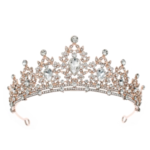 Detailed close-up of a rose gold crown base with sparkling silver rhinestones and crystals