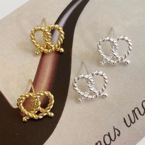 Elegant S925 sterling silver twisted heart knot stud earrings in gold and silver finish