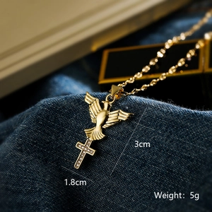 Detail view of gold cross pigeon pendant with size 1.8x3cm and 5g weight data