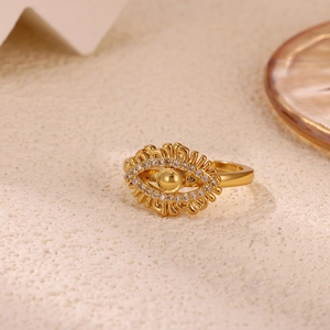 Detailed macro view of gold-plated Evil Eye ring featuring white zircon accents