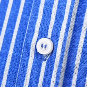 Vertical blue and white striped linen shirt for women featuring a white button detail