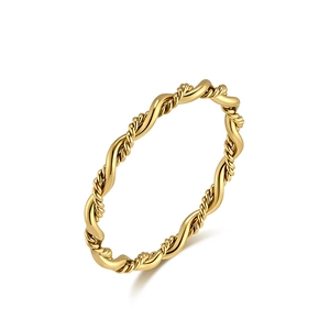 Golden twisted rope and wavy minimalist ring for women, shown in a 45-degree angle view