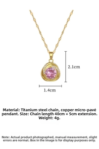Detailed view of a gold titanium necklace with a pink zircon pendant and measurement specs