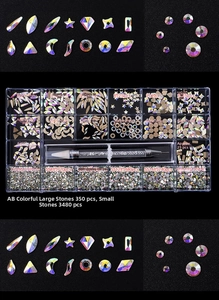 Macro detail of AB iridescent glass nail rhinestones in a 21-grid organizer box