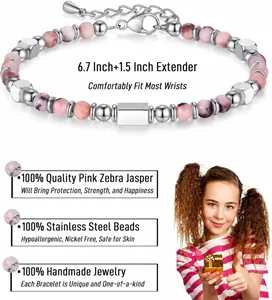 Detail of 4mm Pink Zebra Jasper beads and stainless steel chain on a handmade bracelet