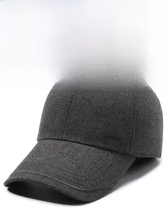 Close-up of thick dark grey wool blend baseball cap fabric with metal GABACK logo