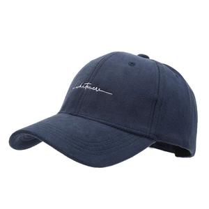 Navy blue baseball cap with white Whatever embroidery and structured six-panel design