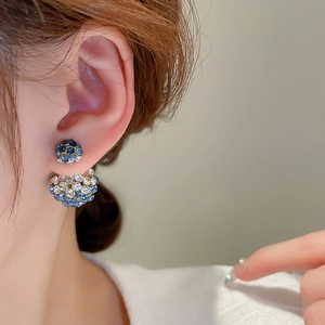 French vintage double-sided blue and white crystal ball stud earrings on model