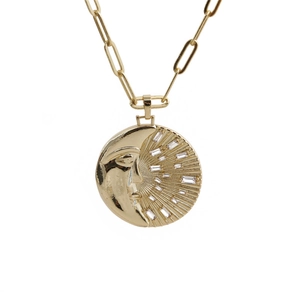 Golden crescent moon and sun face pendant necklace with cubic zirconia on paperclip chain