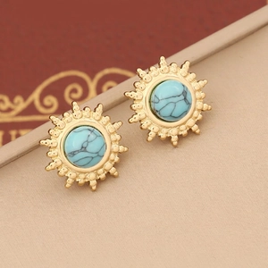 Star-shaped gold-plated stud earrings with turquoise stones in bohemian vintage style