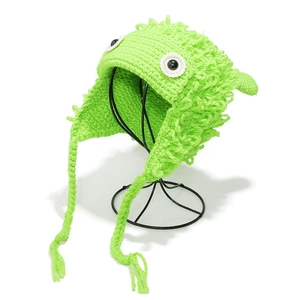 Handmade green crochet monster hat with big eyes and earflaps for winter fashion