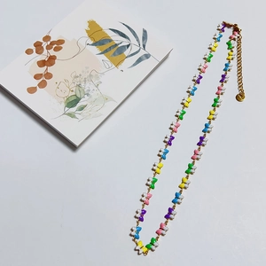 Colorful butterfly bead necklace with gold lobster clasp and extension chain