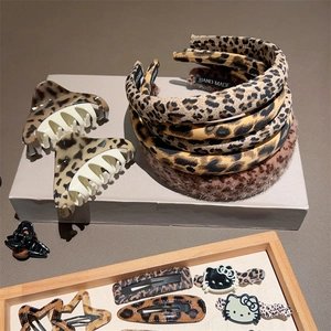Leopard print hair accessory set with headbands, claw clips and stylish hairpins