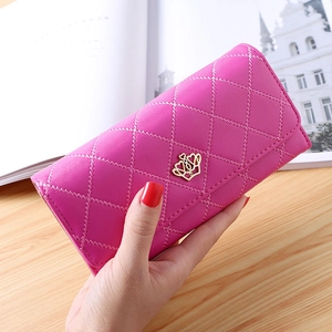 Close-up of rose red quilted PU leather long wallet with golden crown metal clasp detail