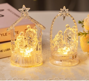 Detailed view of LED lighted Nativity scene with acrylic manger in warm white glow