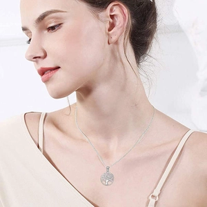 925 silver Tree of Life necklace with round pendant shown on female model neck