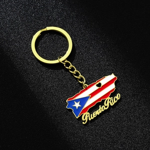 Detail of Puerto Rico map pendant keychain featuring flag colors and gold script text