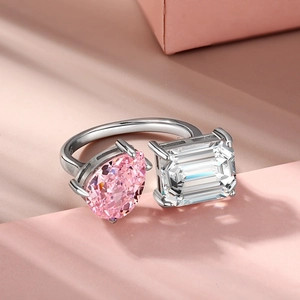 Detailed close-up of S925 silver open ring with pink pear-cut and clear rectangular stones
