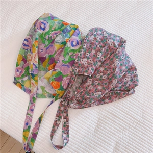 Detailed flat lay of floral print cotton shoulder bags in retro and artistic patterns
