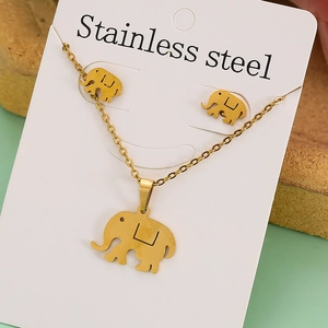 Detailed view of golden stainless steel elephant pendant necklace and earring set