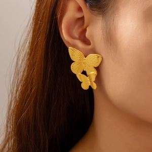Elegant gold double-layered butterfly stud earrings in polished titanium steel for women