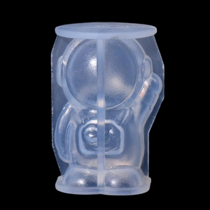 Macro shot of translucent silicone astronaut mold featuring precise textures and details