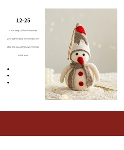 Detail of wool felt snowman ornament with red scarf and hat on white plush surface