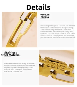 Detail of vacuum plated stainless steel gold bangle with engraved LOVE lettering design