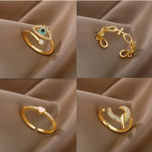 Luxurious adjustable gold open rings featuring evil eye, heart, and geometric designs