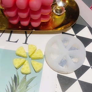 6-cavity cheese-shaped silicone mold with yellow resin craft pieces for DIY baking decoration