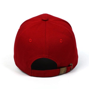 Detail view of the red cotton baseball cap back with adjustable metal buckle strap