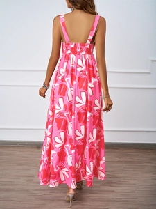 Detail view showing the backless floral maxi dress with elastic smocked back detail
