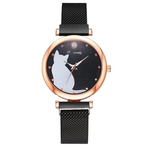 Detail of a chic cat silhouette dial on a rose gold mesh strap quartz watch for women